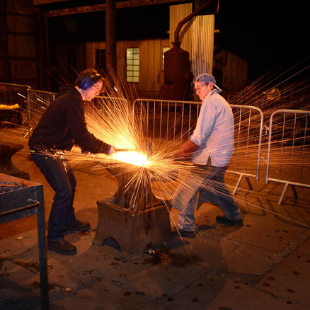 Roy Abbott demonstrating traditional blacksmithing.